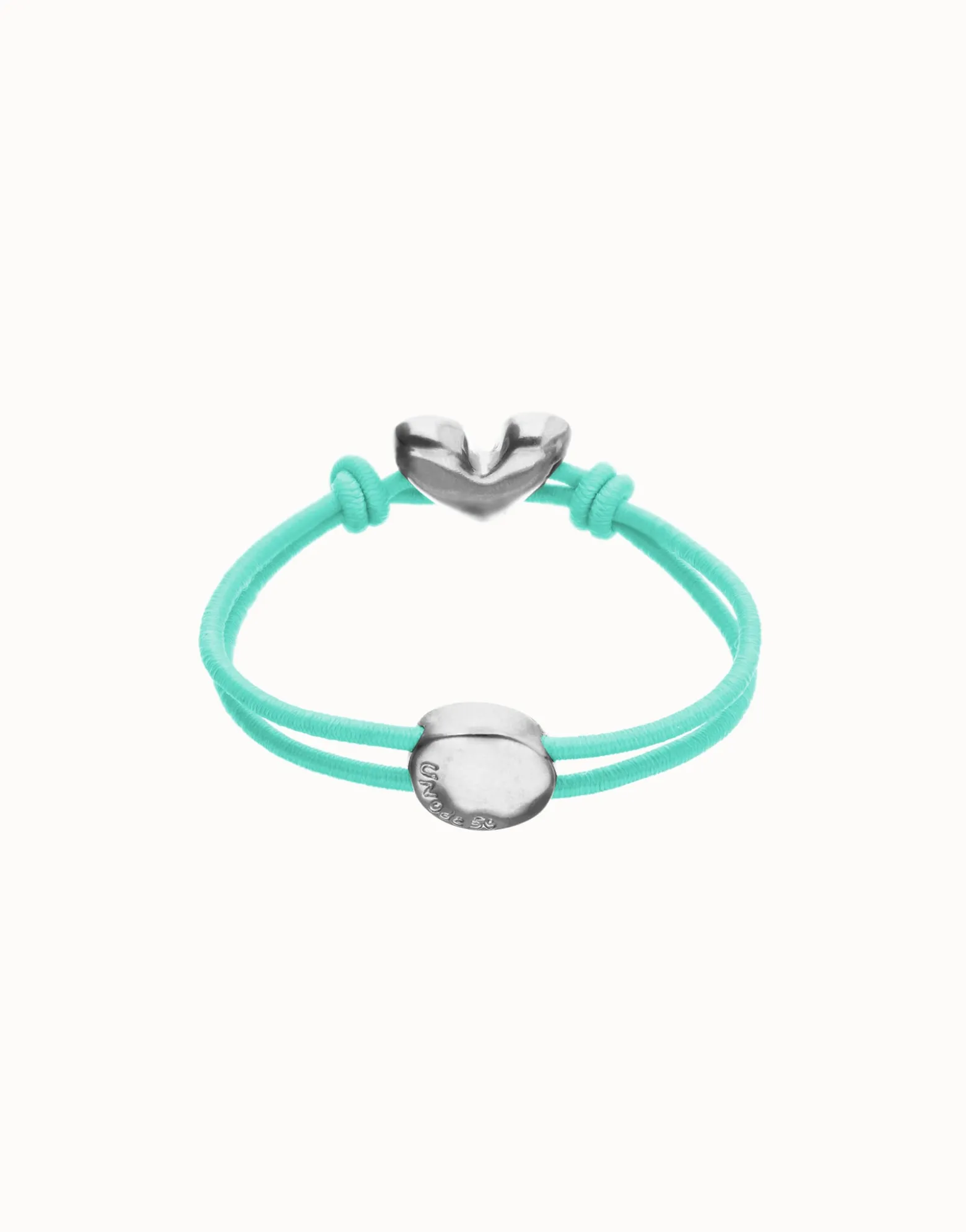 Pulsera de hilo elástico turquesa con corazón bañado en plata de ley