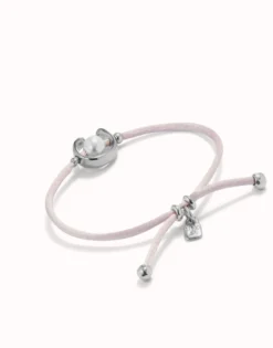 Pulsera de hilo lila con perla shell fornitura bañada en plata de ley.