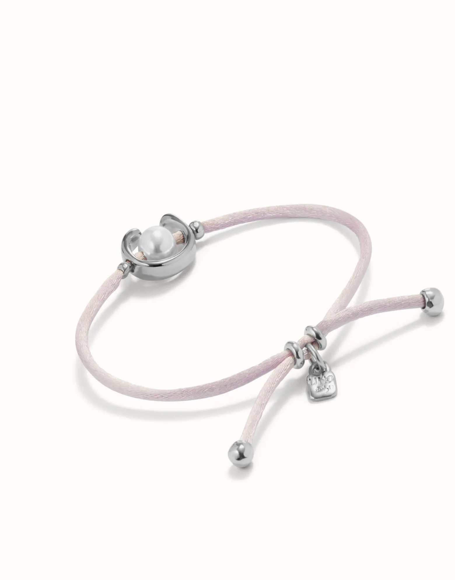 Pulsera de hilo lila con perla shell fornitura bañada en plata de ley.