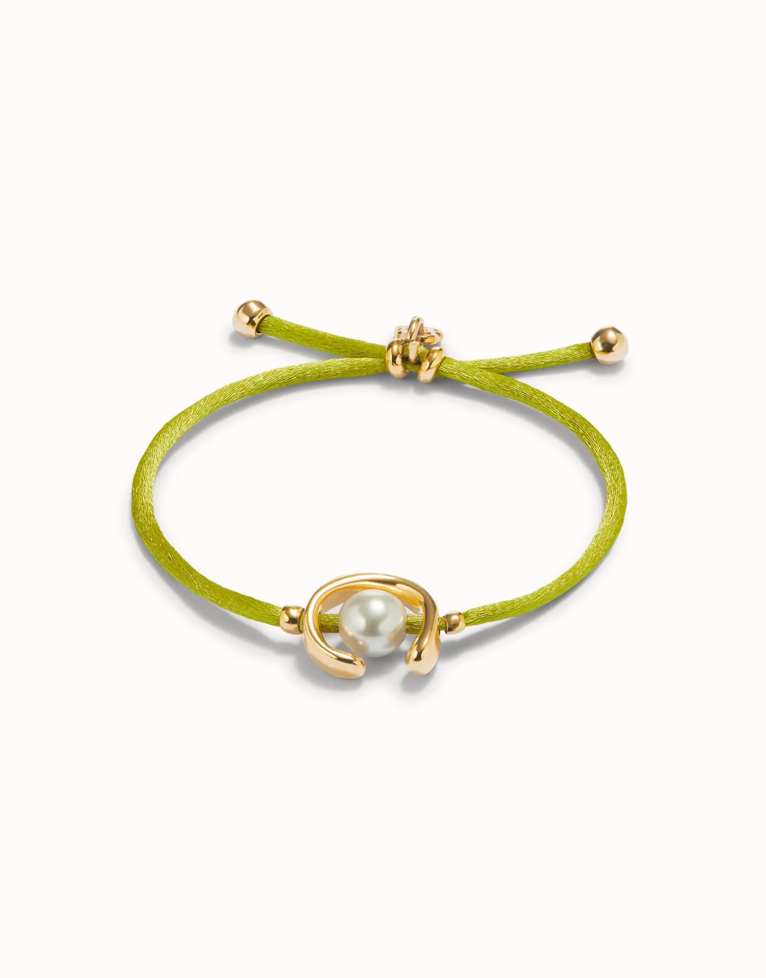 Pulsera de hilo lima con perla shell fornitura bañada en oro 18k.