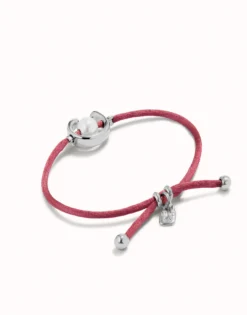 Pulsera de hilo malva con perla shell fornitura bañada en plata de ley.