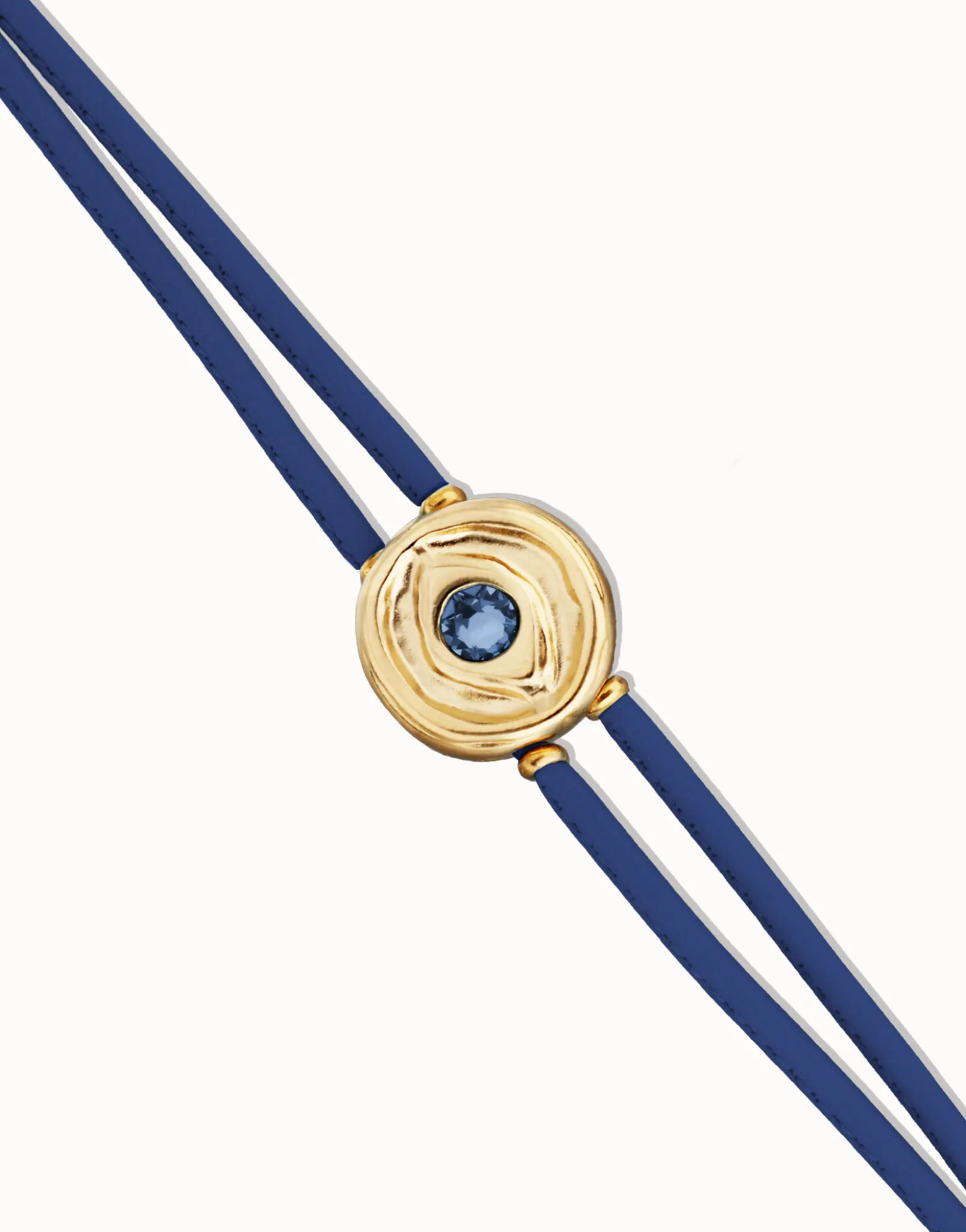 Pulsera doble de cuero azul con ojo bañado en oro 18k