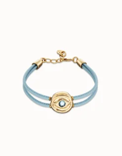 Pulsera doble de cuero celeste con ojo bañado en oro 18k