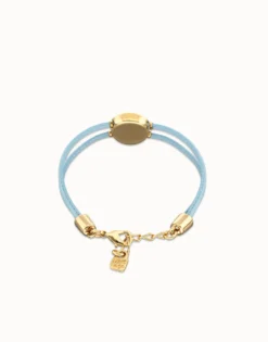 Pulsera doble de cuero celeste con ojo bañado en oro 18k
