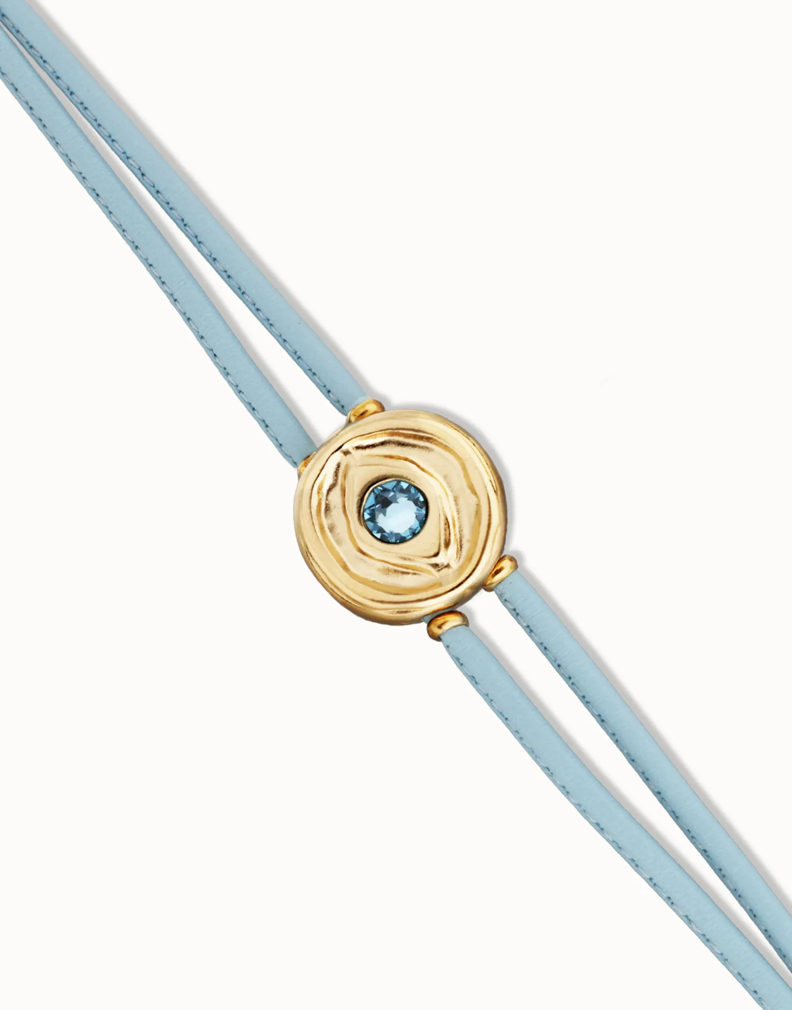 Pulsera doble de cuero celeste con ojo bañado en oro 18k