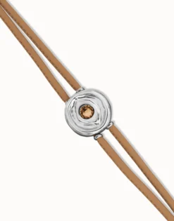 Pulsera doble de cuero crema con ojo bañado en plata de ley