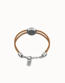 Pulsera doble de cuero crema con ojo bañado en plata de ley