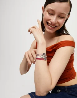 Pulsera doble de cuero fucsia con ojo bañado en plata de ley