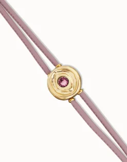 Pulsera doble de cuero lila con ojo bañado en oro 18k