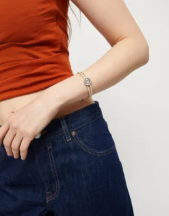 Pulsera doblede cuero marfil con ojo bañado en plata de ley