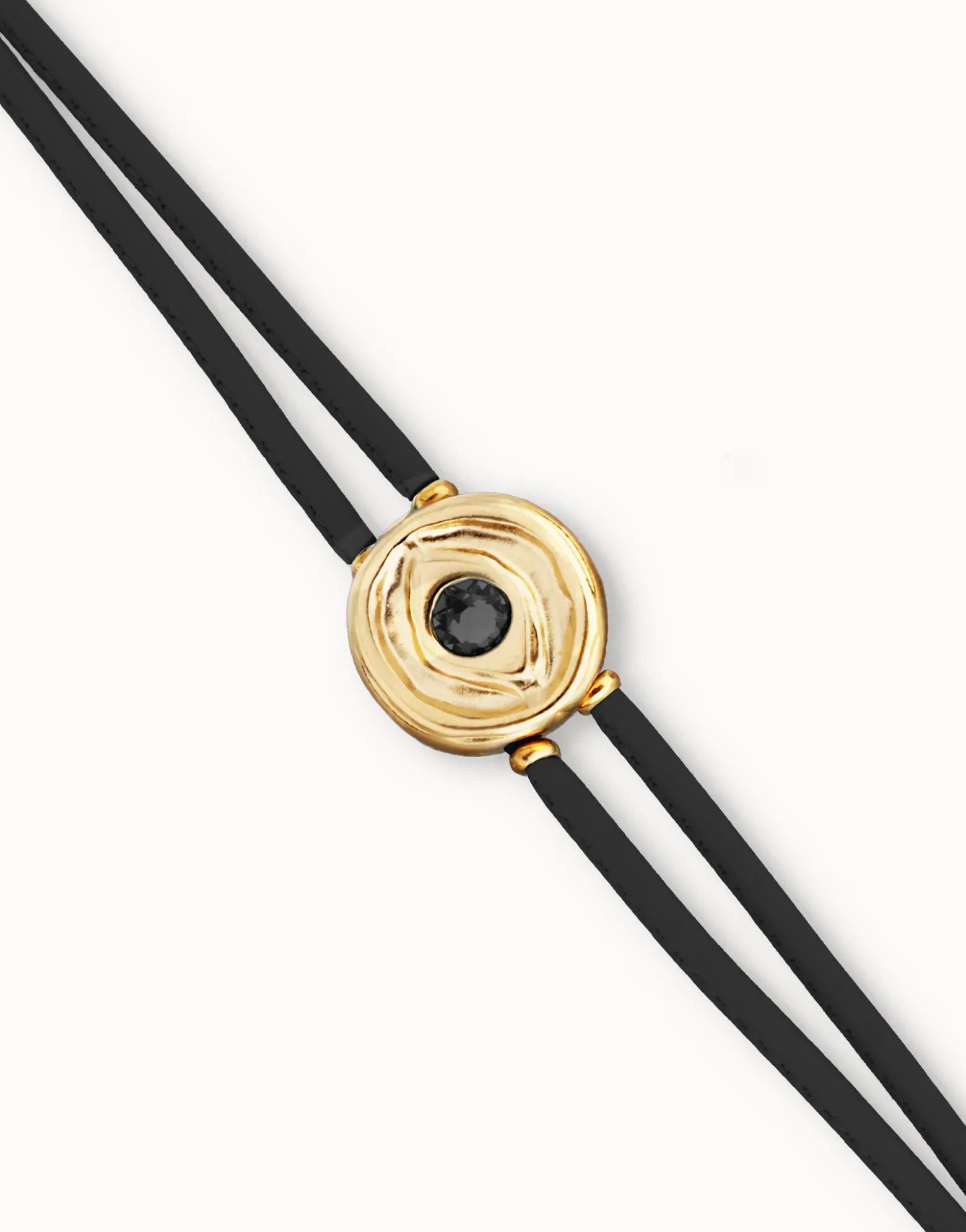Pulsera doble de cuero negro con ojo bañado en oro 18k