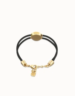 Pulsera doble de cuero negro con ojo bañado en oro 18k