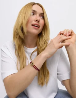 Pulsera doble de cuero rojo con ojo bañado en oro 18k
