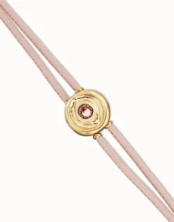 Pulsera doble de cuero rosa con ojo bañado en oro 18k