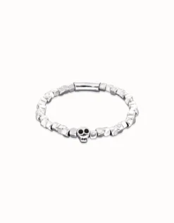 Pulsera elástica bañada en plata de ley con una calavera