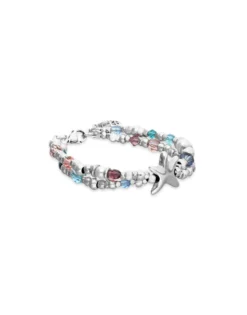 Pulsera elástica bañada en plata con cristales facetados y estrella de mar