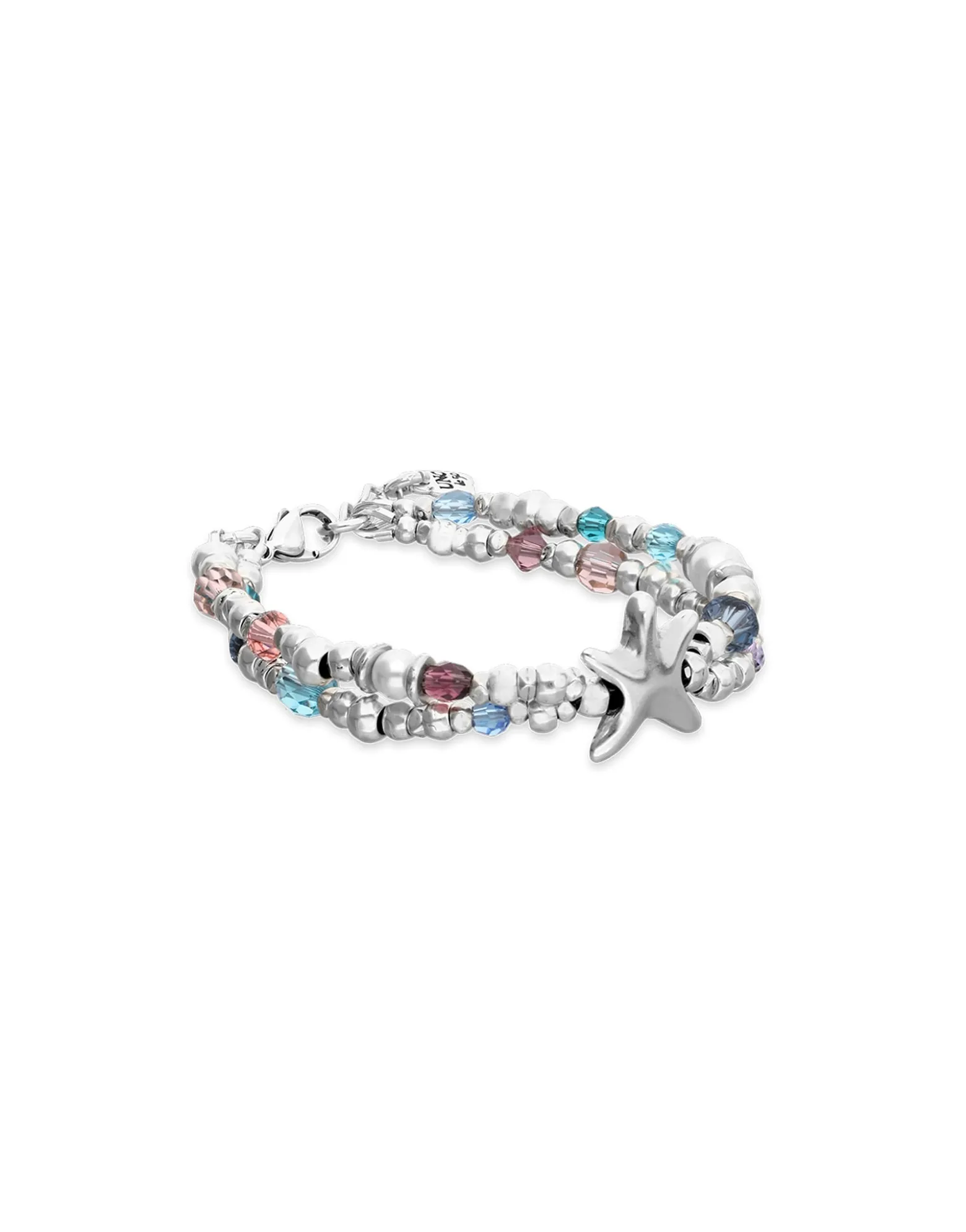 Pulsera elástica bañada en plata con cristales facetados y estrella de mar