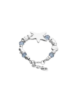 Pulsera elástica bañada en plata con cristales azules y estrella de mar