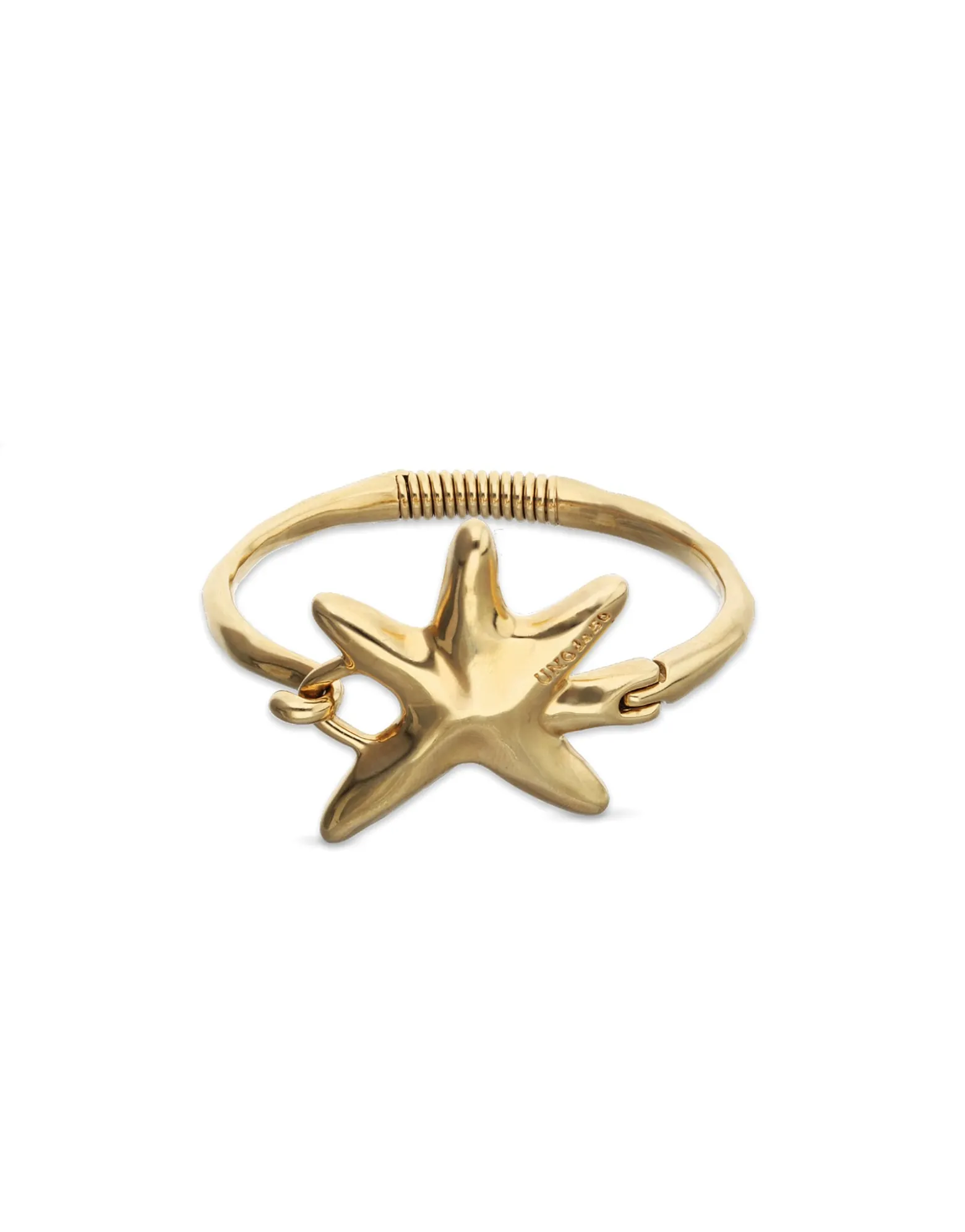 Pulsera rígida bañada en oro con estrella de mar