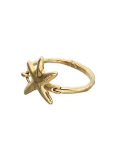 Pulsera rígida bañada en oro con estrella de mar