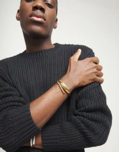 Pulsera rígida bañada en oro 18k con tres formas orgánicas entrelazadas