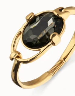 Pulsera rígida bañada en oro 18k con cristal facetado ovalado gris