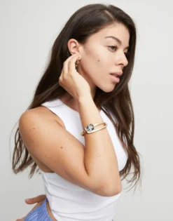 Pulsera rígida bañada en oro 18k con cristal facetado negro