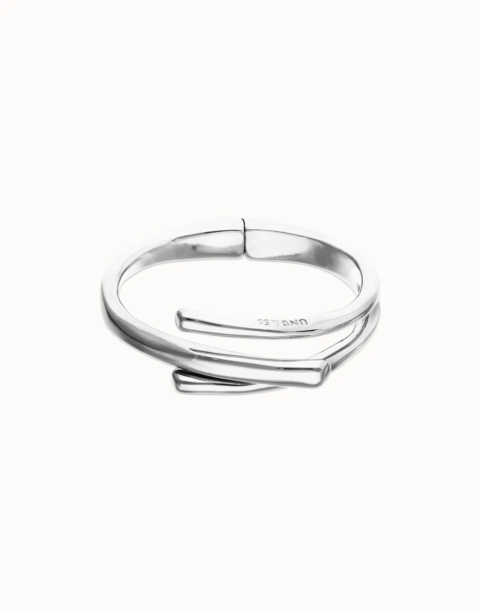 Pulsera rígida bañada en plata de ley con tres formas orgánicas entrelazadas