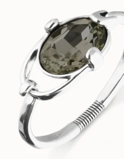 Pulsera rígida bañada en plata de ley con cristal facetado ovalado gris
