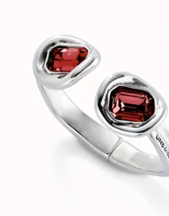 Pulsera rígida bañada en plata de ley y dos cristales rojos