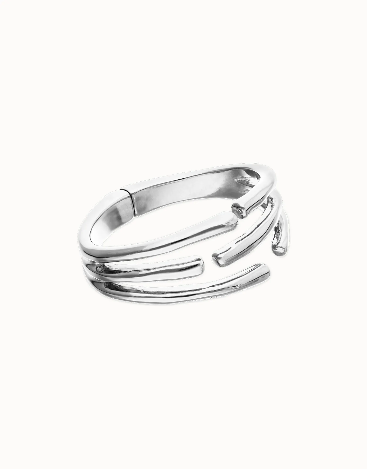 Pulsera rígida con múltiples formas orgánicas entrelazadas bañada en plata de ley
