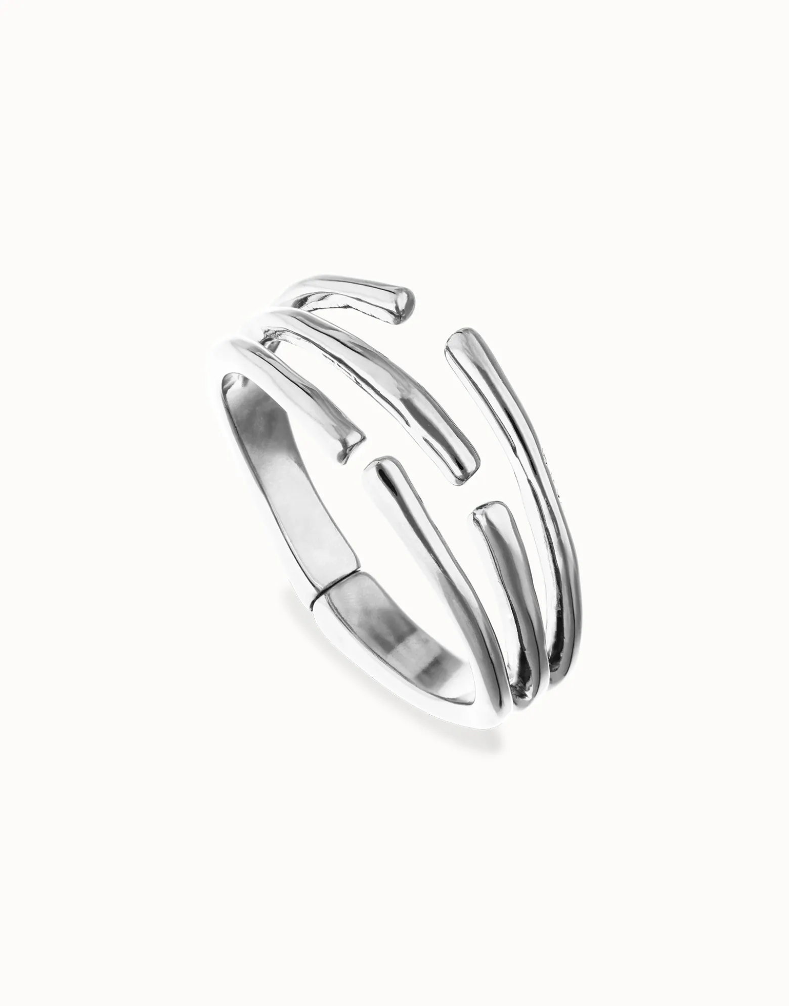 Pulsera rígida con múltiples formas orgánicas entrelazadas bañada en plata de ley
