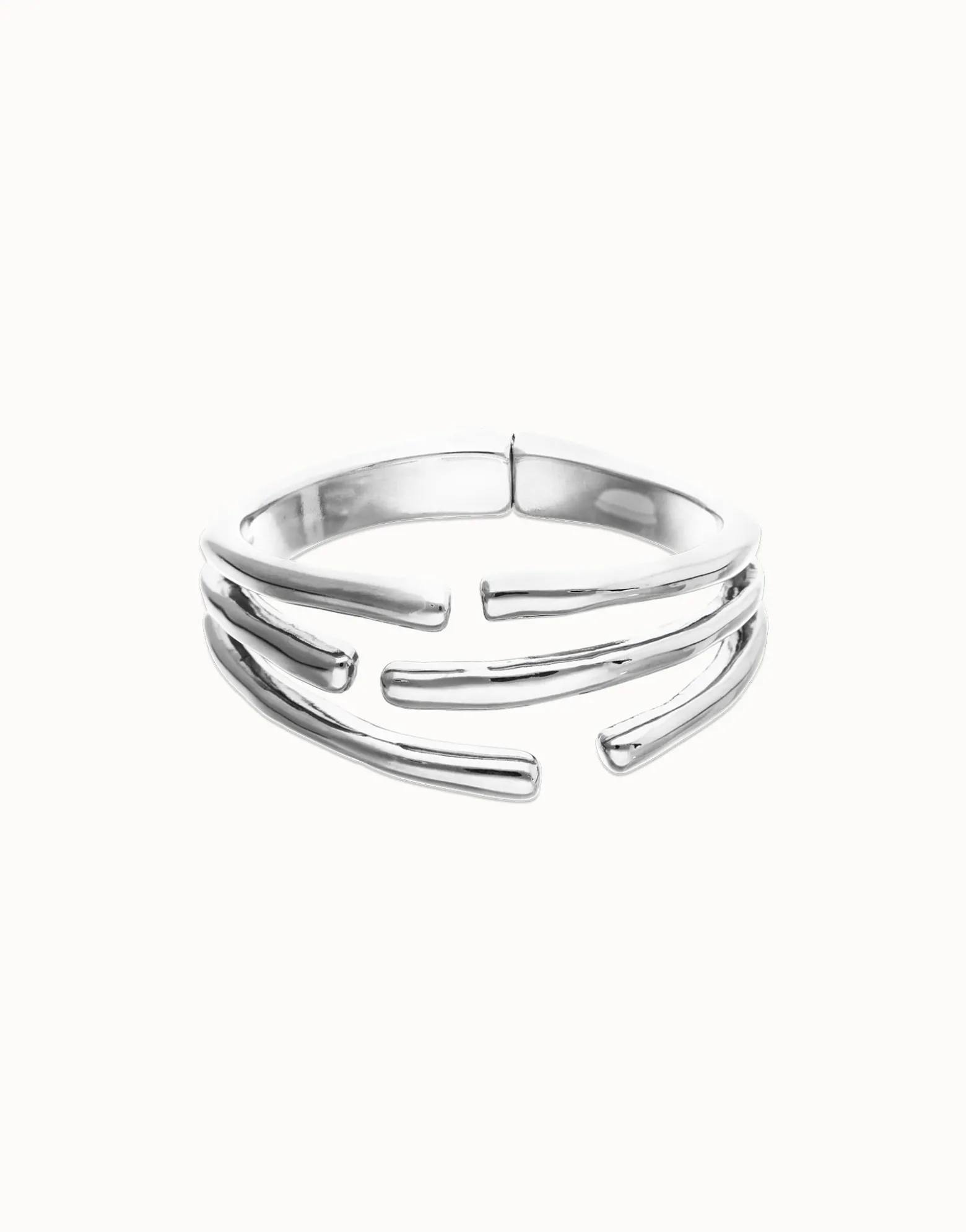 Pulsera rígida con múltiples formas orgánicas entrelazadas bañada en plata de ley