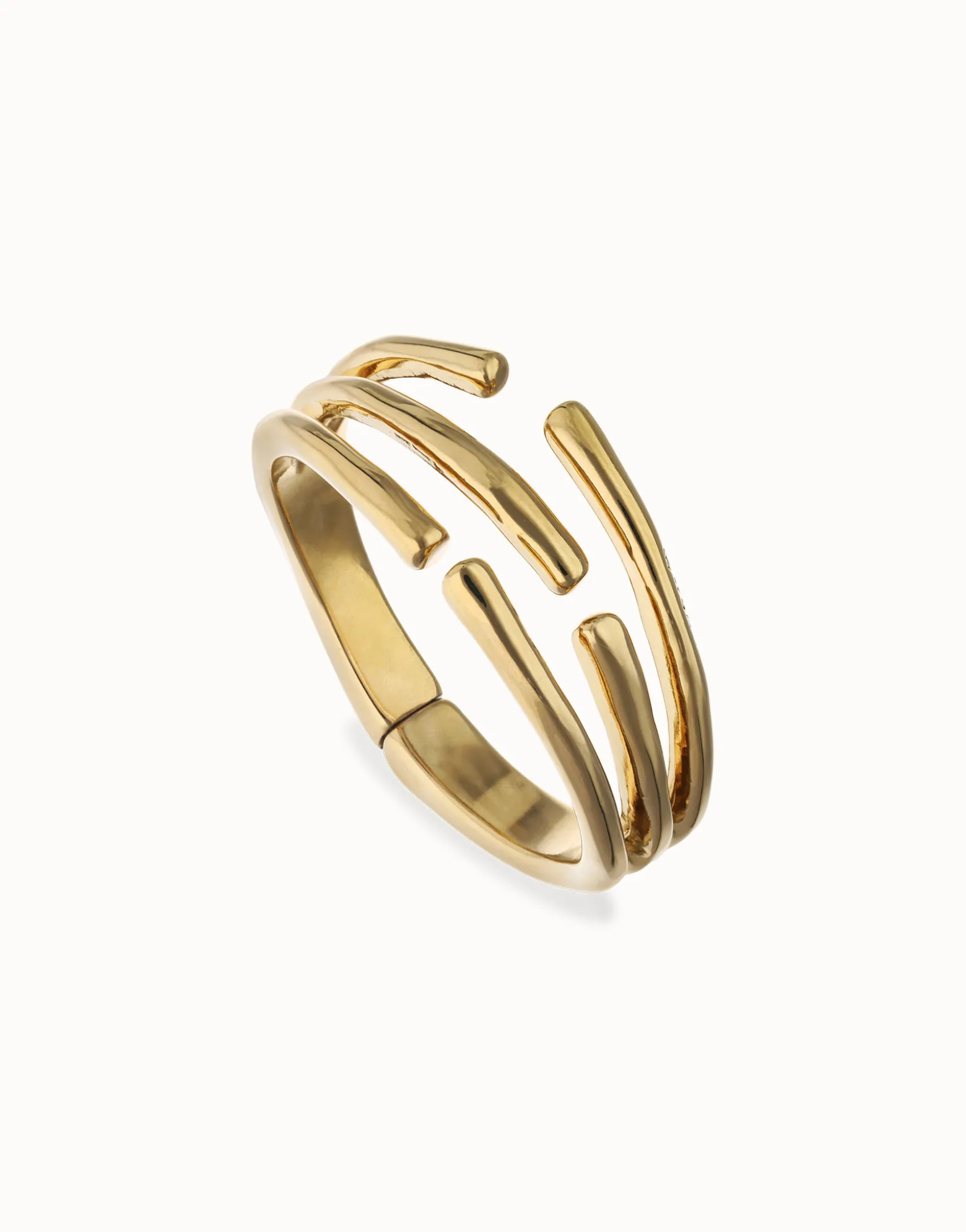 Pulsera rígida con múltiples formas orgánicas entrelazadas bañada en oro 18k