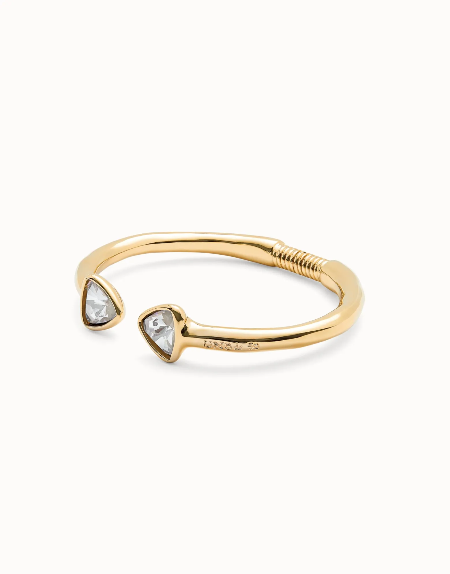 Pulsera rígida fina bañada en oro 18k con dos cristales facetados multicolor