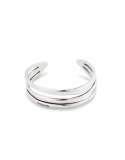 Pulsera rígida triple con curvas bañada en plata de ley