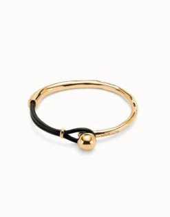 Pulsera semirígida bañada en oro 18k con cuero de color marrón