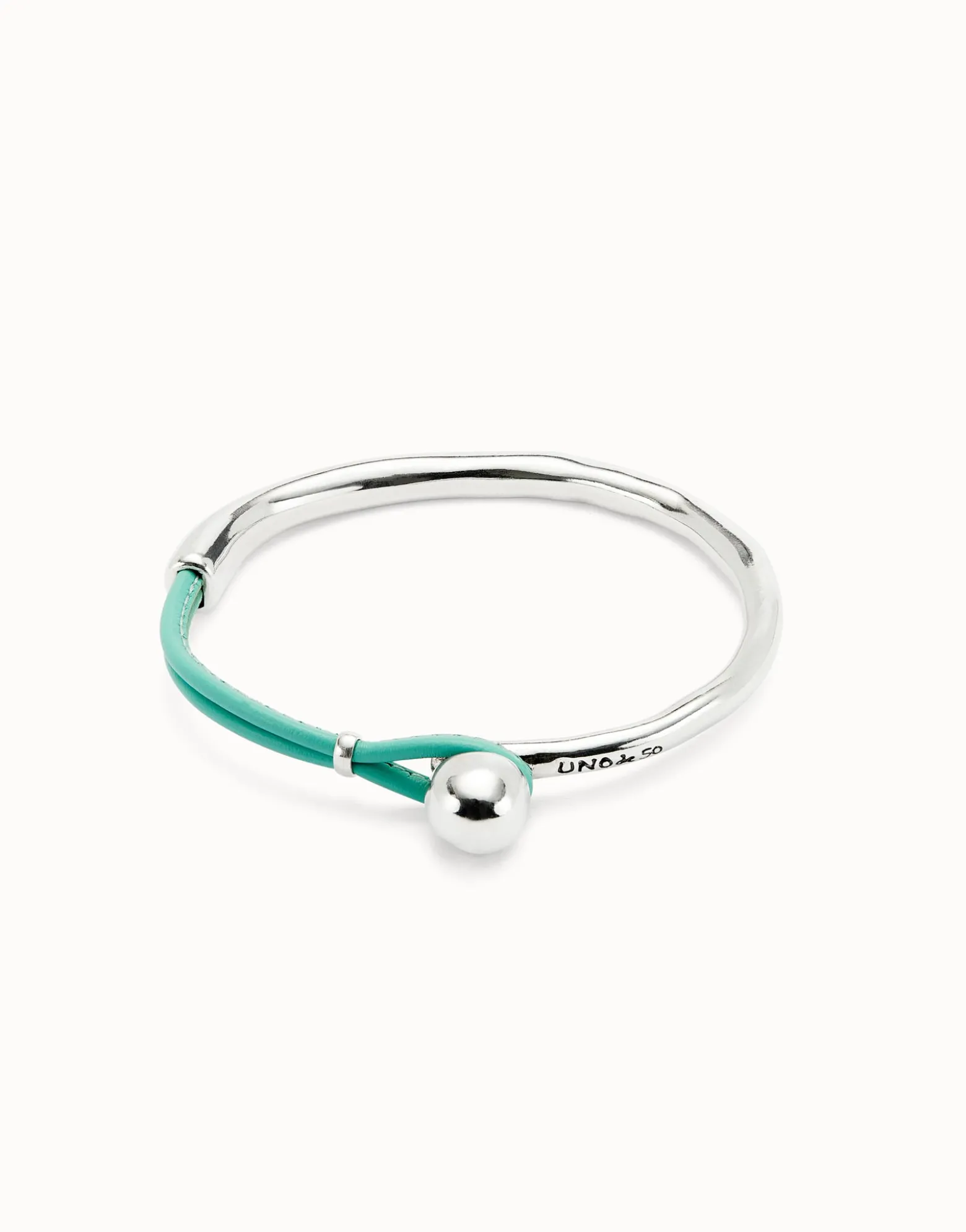 Pulsera semirígida bañada en plata de ley con cuero turquesa
