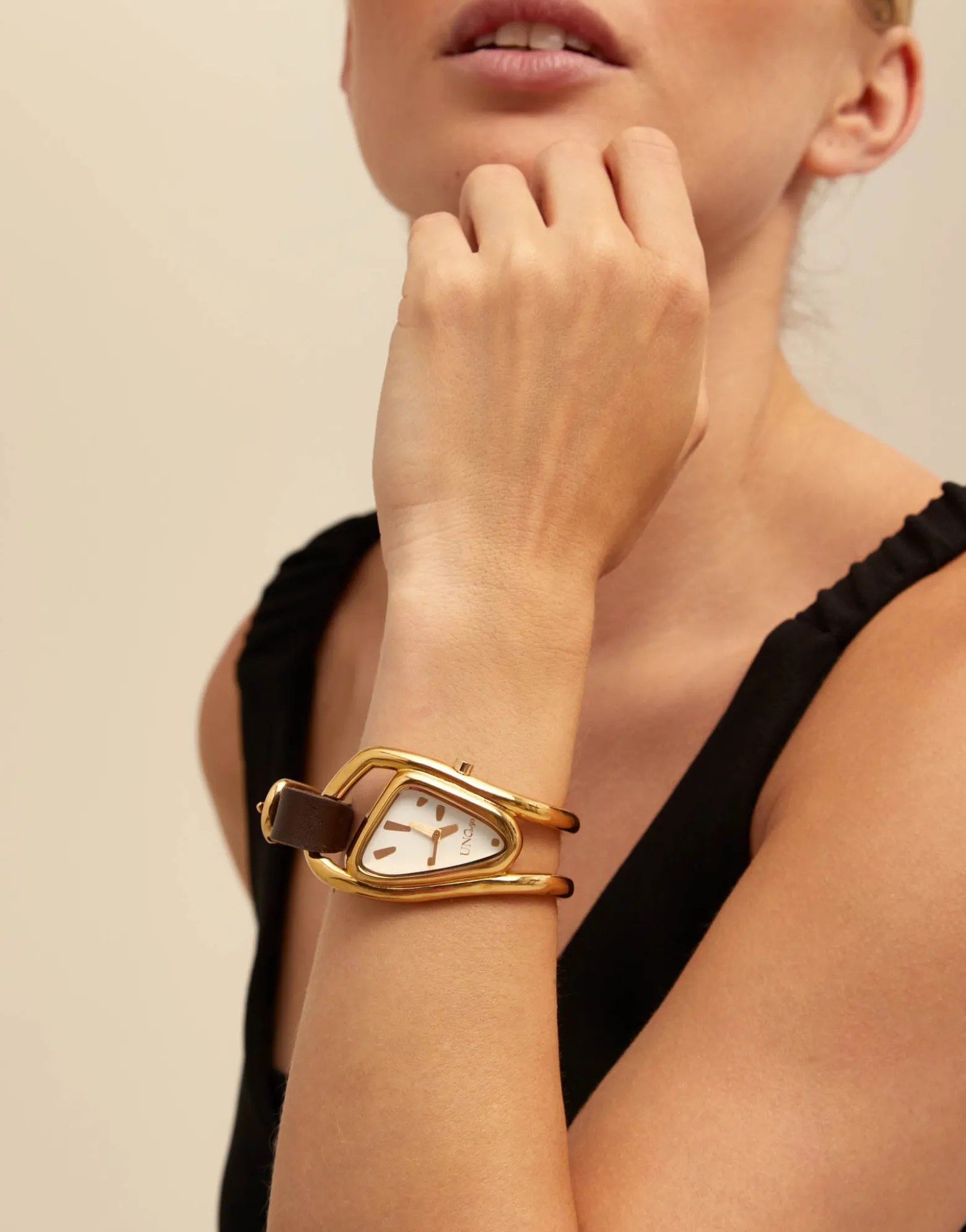 Reloj de piel y metal bañado en oro de 18K